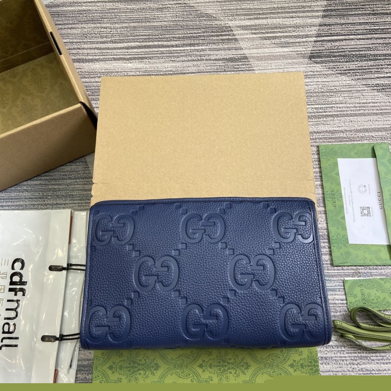 G*u*i clutch bags